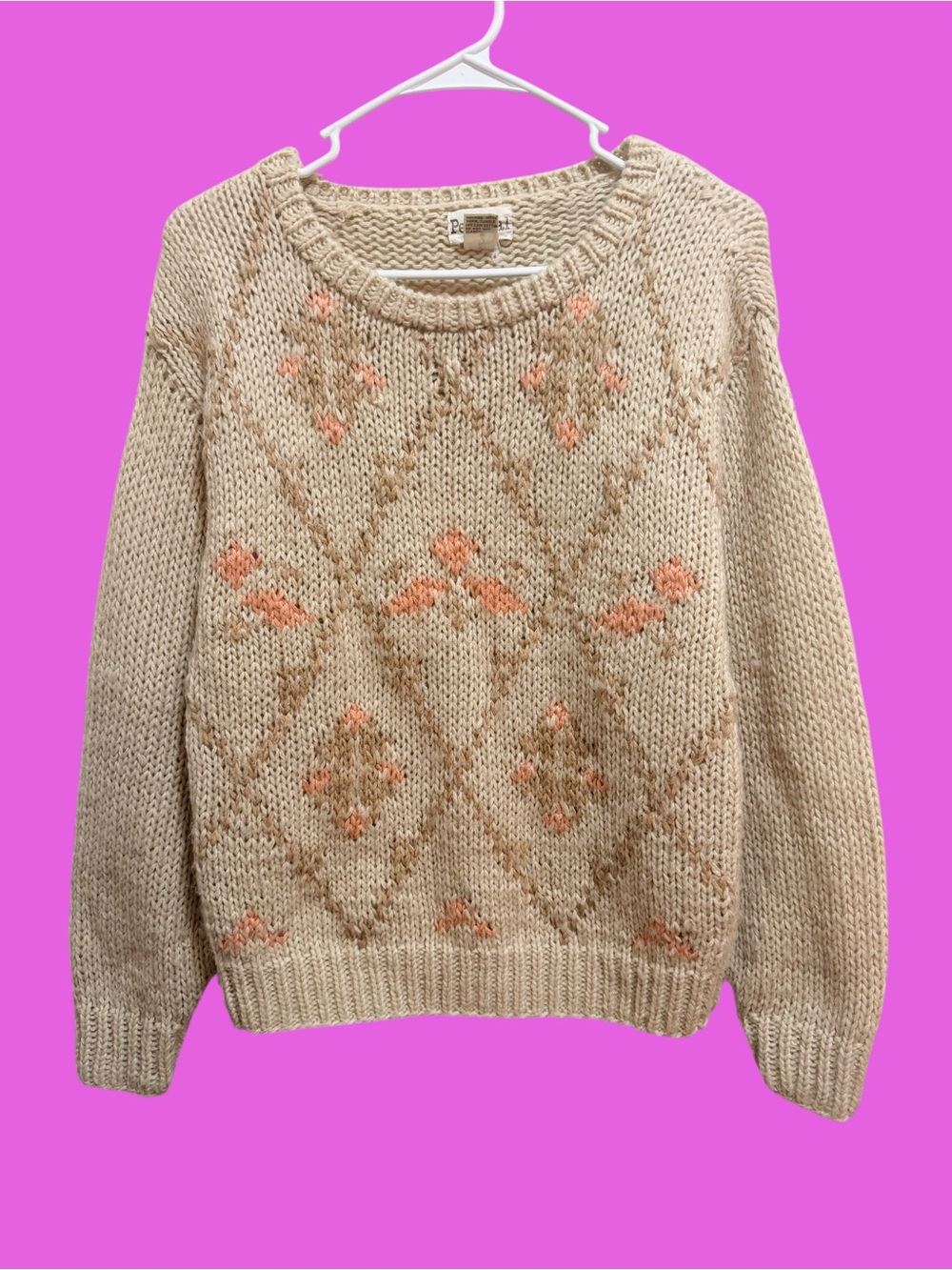 Cozy Cream Knit Sweater with Subtle Peach Pattern